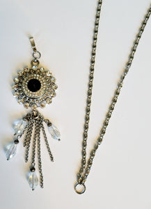 Necklace with detachable tassle pendant and snap