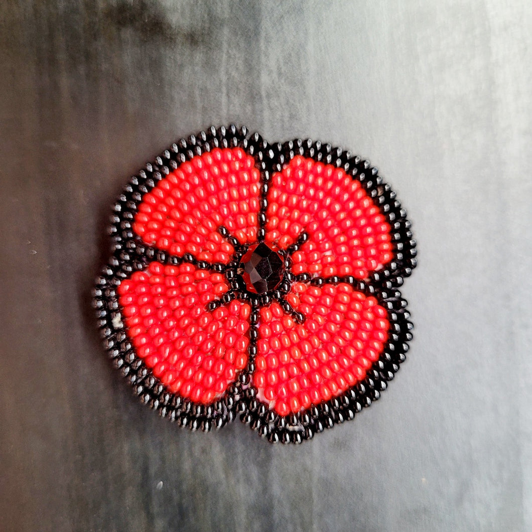 beaded poppy pin first nations indigenous art
