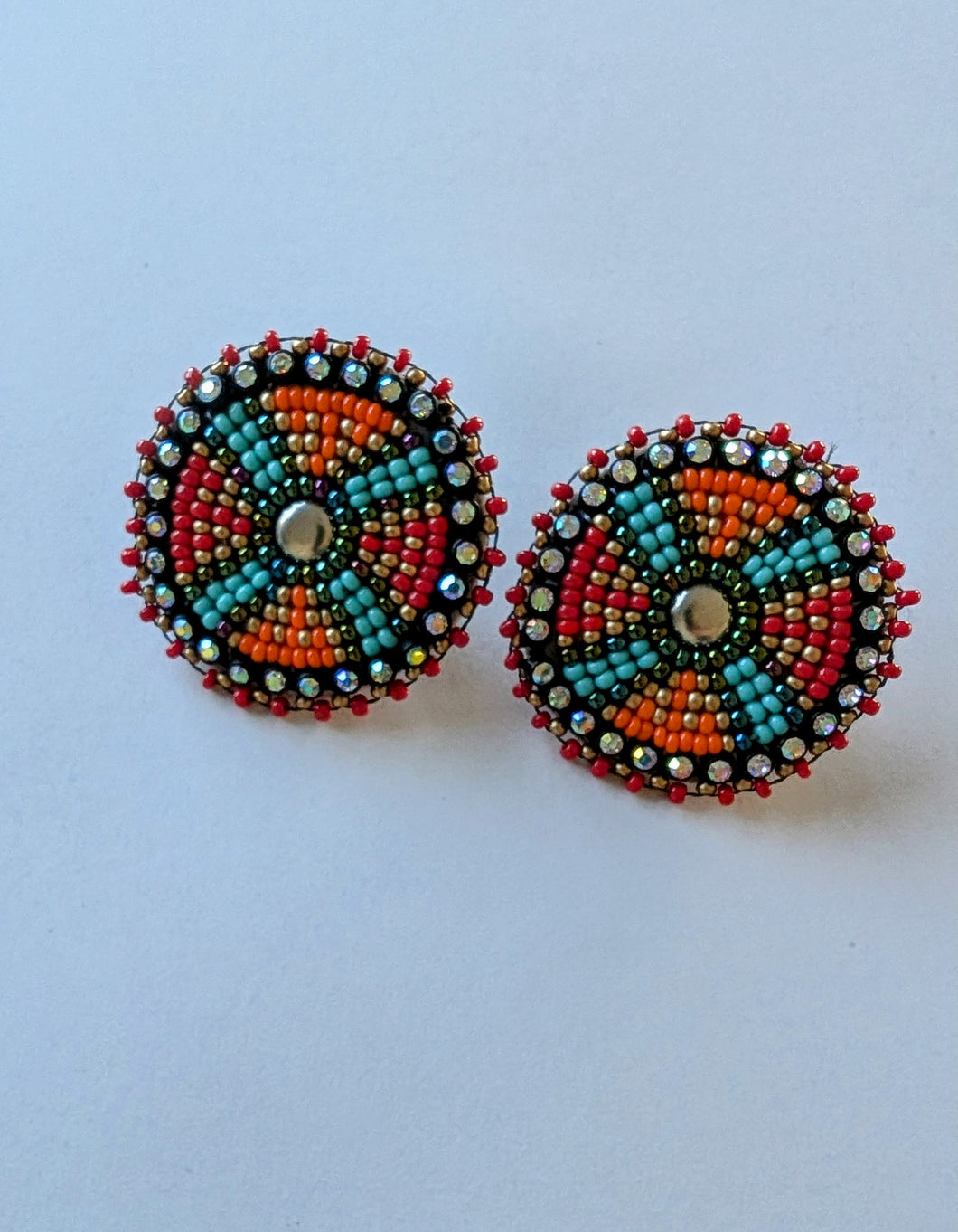 Teal and orange medallion earrings